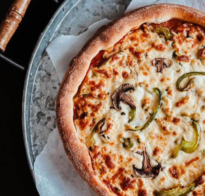 2 POUR 1 PIZZA TOUTE GARNIE